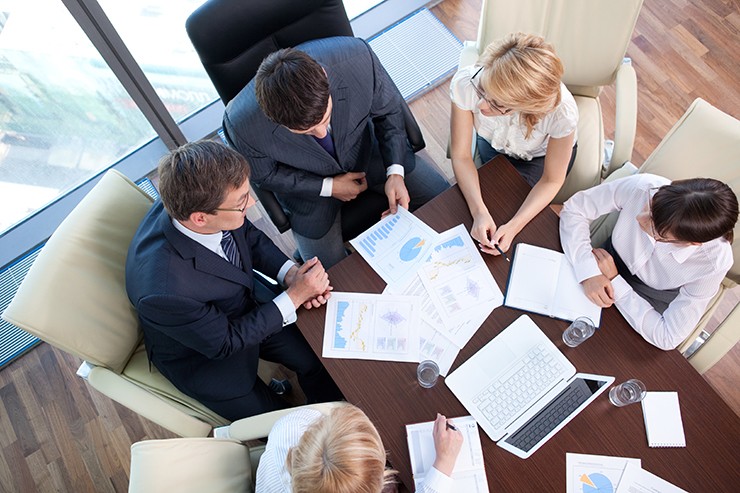 A small pilot team reviewing early results together
